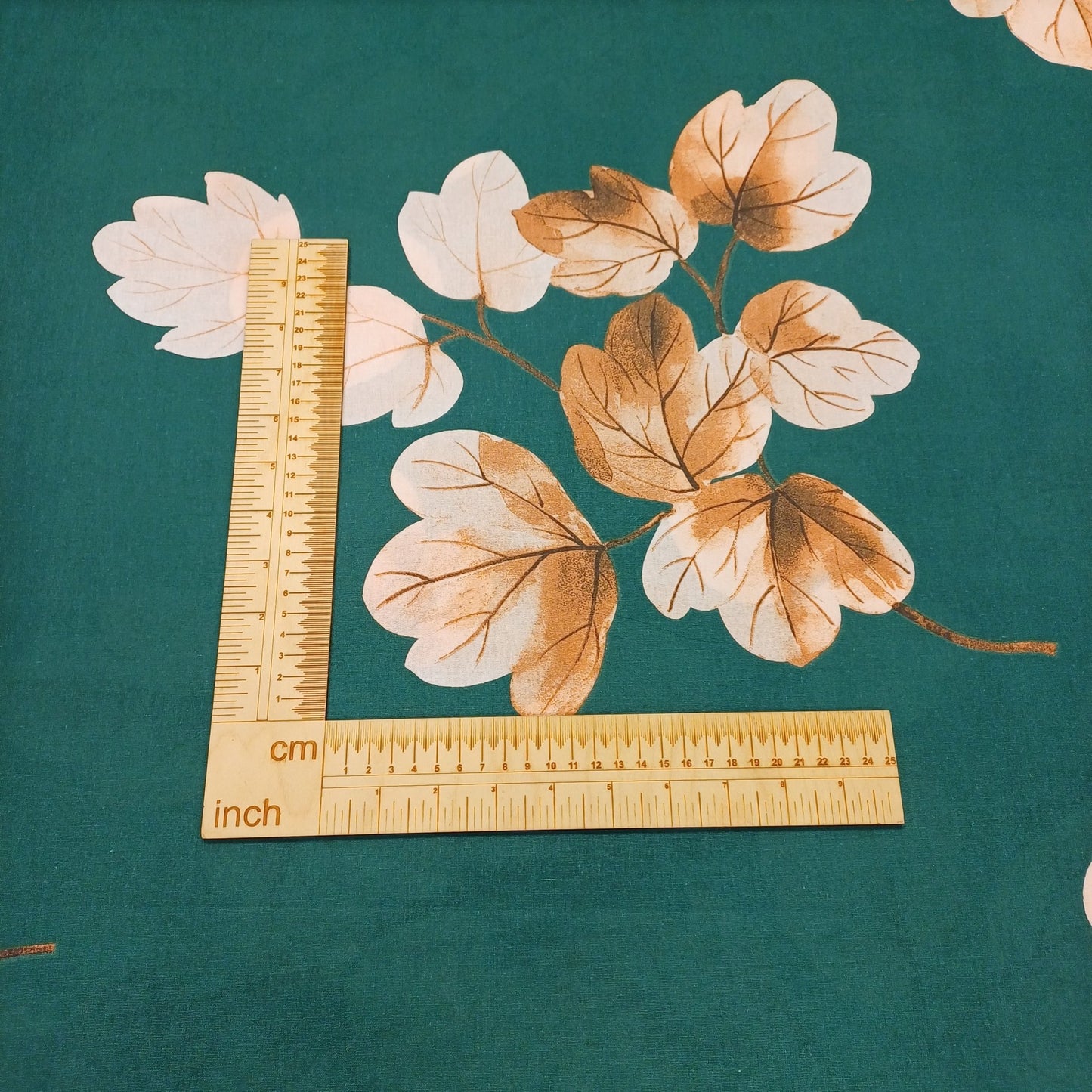 100% Cotton fabric - leaves on an emerald green background 220cm 146 g/m²