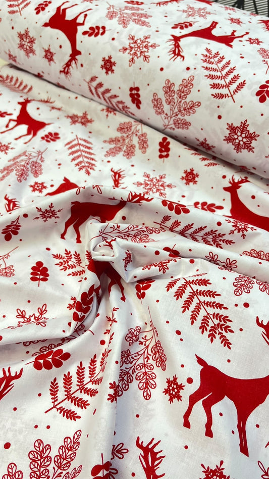 Image of 100% cotton fabric with red deer on a white background – available online at Šarlotes audumi