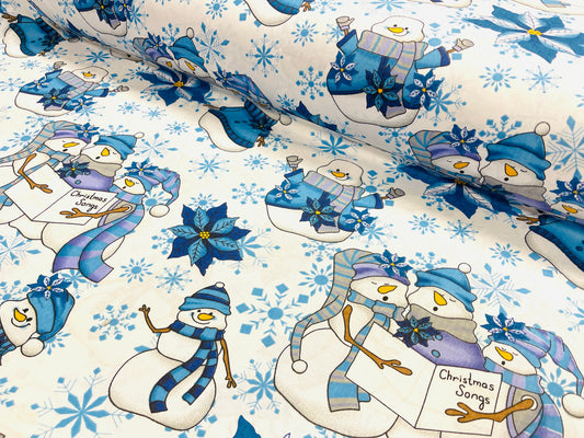 100% cotton fabric - snowman with a blue hat on a white background 130 g/m²