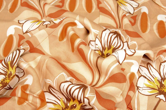 100% viscose fabric - orange flowers 100 g/m²