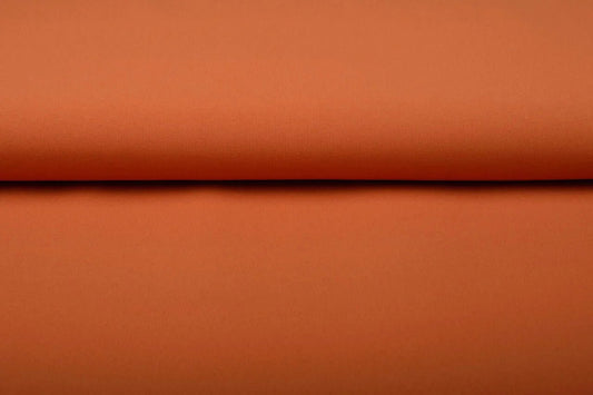 Image of orange gabardine available online at Charlotte's Fabrics