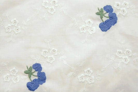 Embroidered cotton fabric - blue flowers 110 g/m²