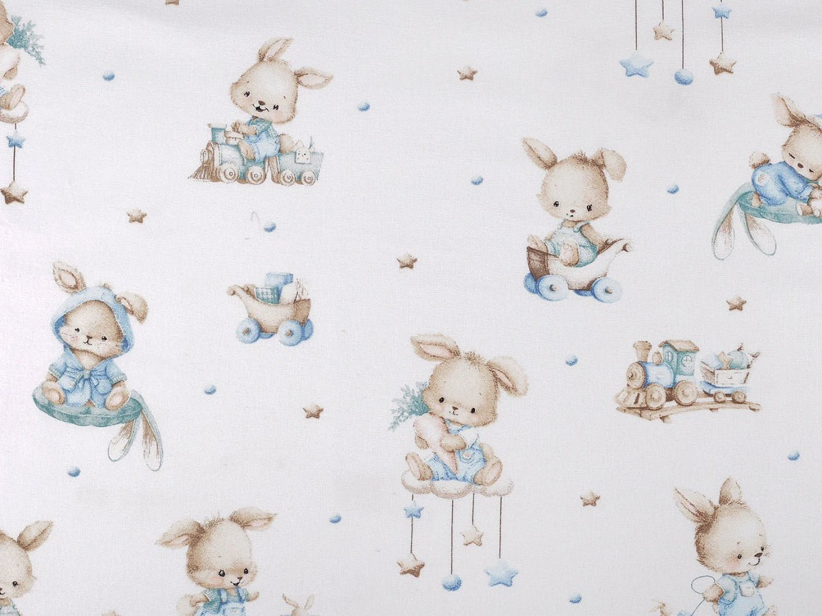 Image of cotton flannel with rabbits in blue accents – available online at Šarlotes audumi
