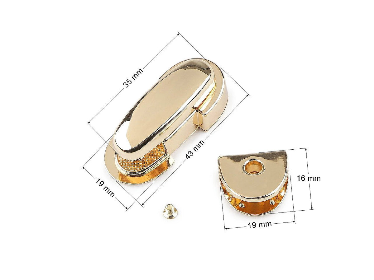 Image of metal bag clasp/lock 19 × 43 mm – available online at Charlotte's Fabrics