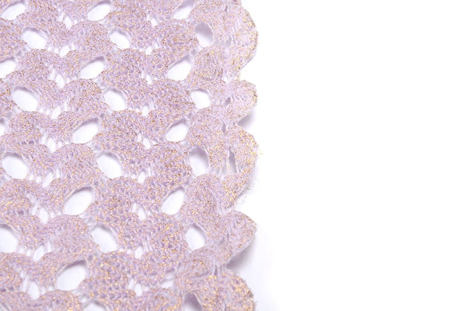 Lace fabric - lilac with gold accents 170 g/m²