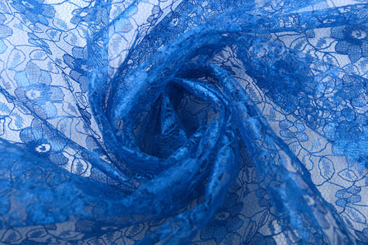 Tissu en dentelle fin - fleurs de bleuet 75 g/m²
