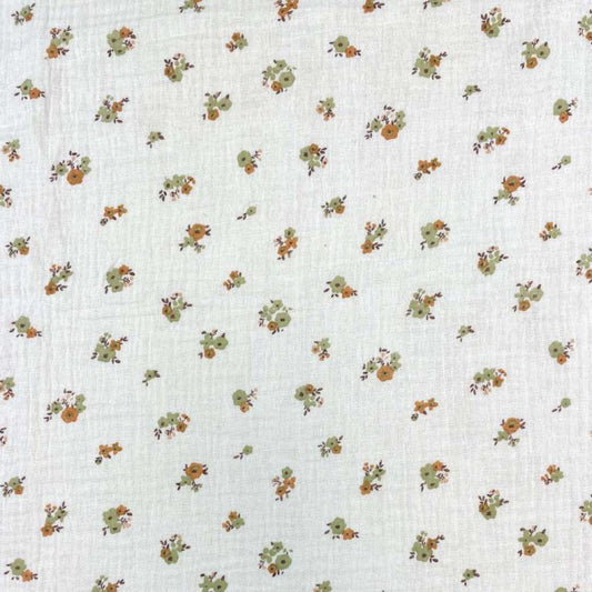 Muslin - flowers on an orange background 130 g/m²