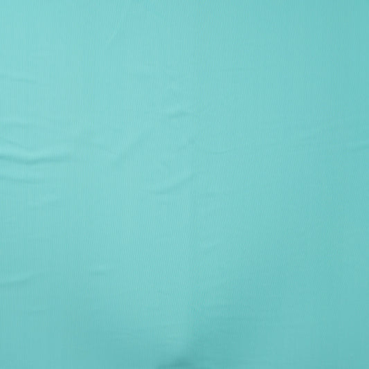 Image d’un tissu de maillot de bain avec UPF 50+ et résistance au chlore, turquoise – disponible en ligne chez Šarlotes audumi