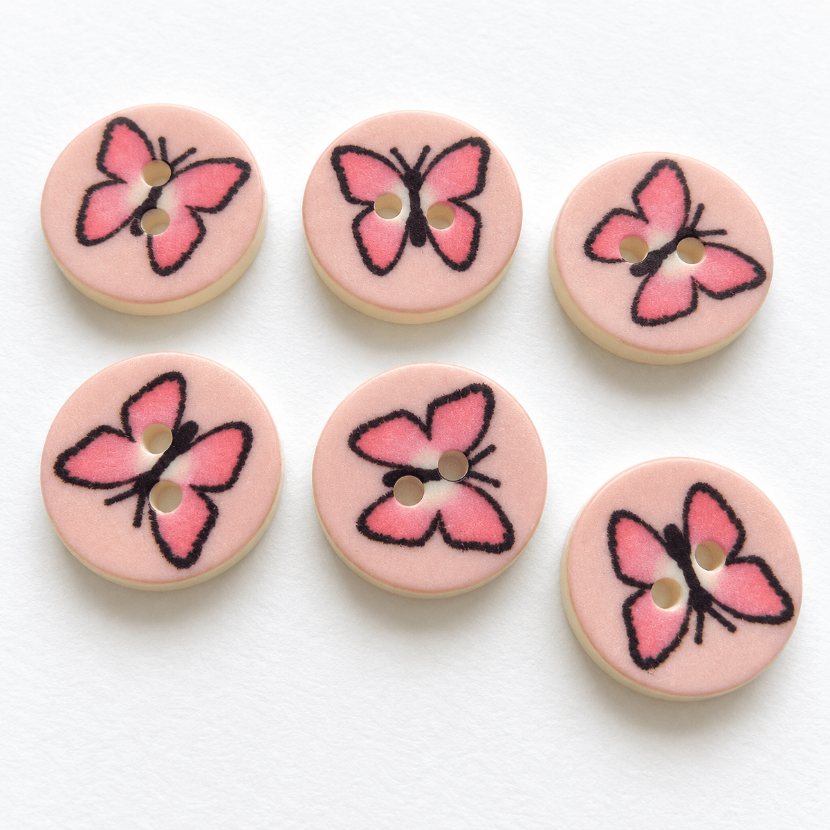 Image of plastic butterfly buttons 14 mm – available online at Charlotte's Fabrics