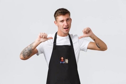 Attēls ar Priekšauts melns ar personalizētiem kaķiem – pieejams Šarlotes audumi