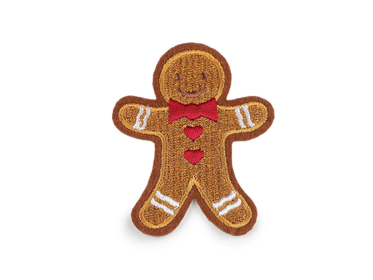 Image of Iron-on gingerbread man patch 5 x 6.2 cm – embroidered fabric patch – available online at Šarlotes audumi