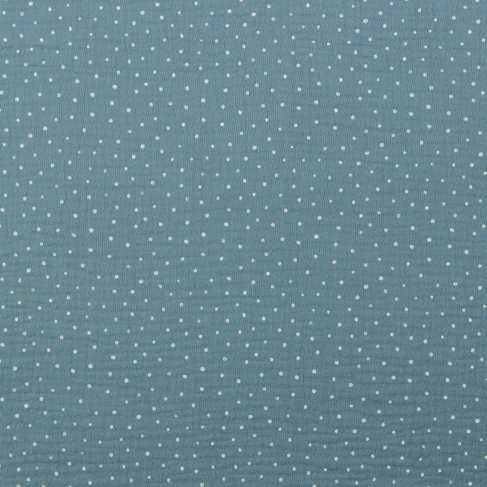 Muslin dots on a blue background 125 g/m²