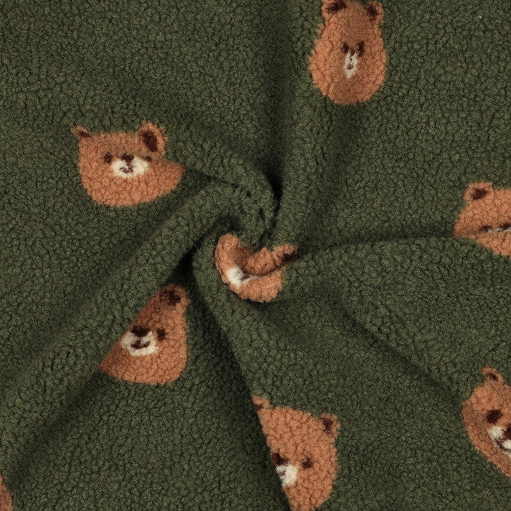 Teddy fleece bears on dark green