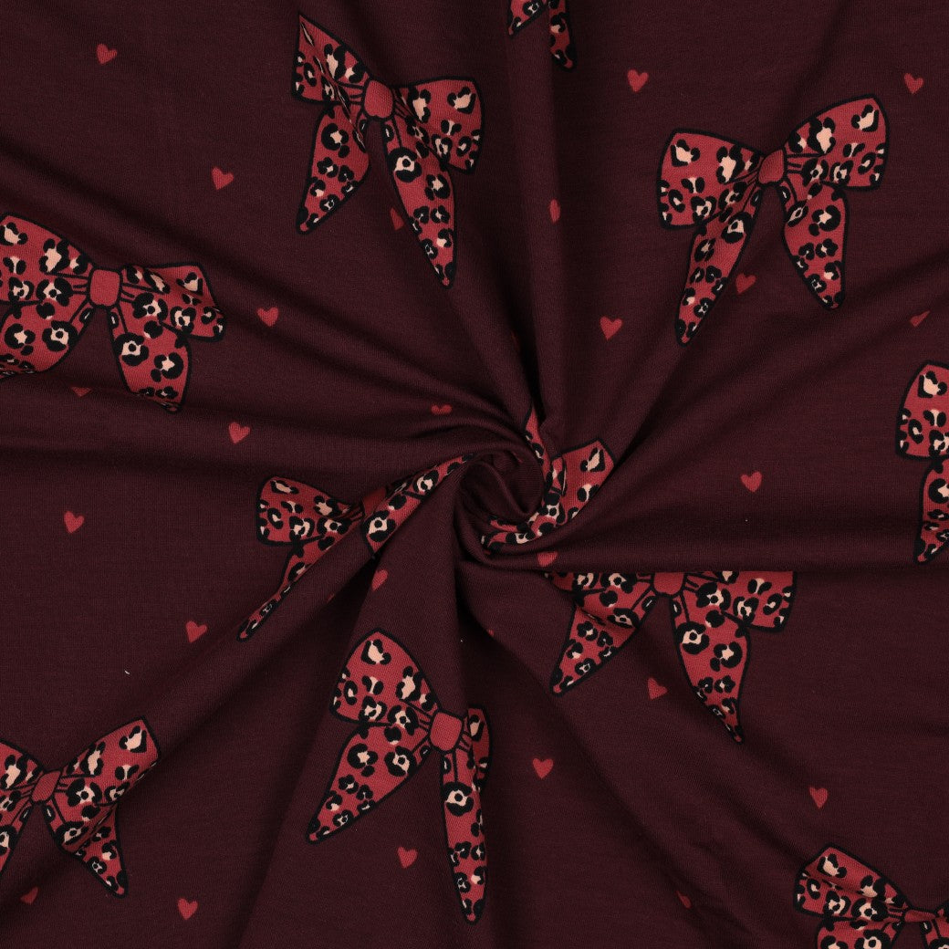 Cotton loopback knit bows on burgundy
