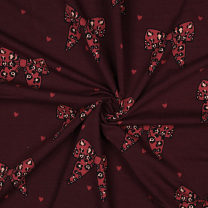 Cotton loopback knit bows on burgundy
