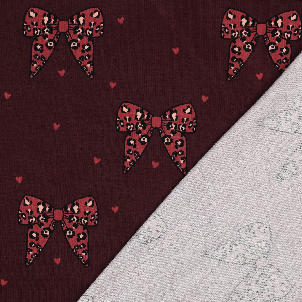 Cotton loopback knit bows on burgundy