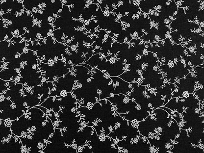 Image en tissu 100 % coton — fleurs blanches sur fond noir, 125 g/m² – disponible chez Šarlotes audumi
