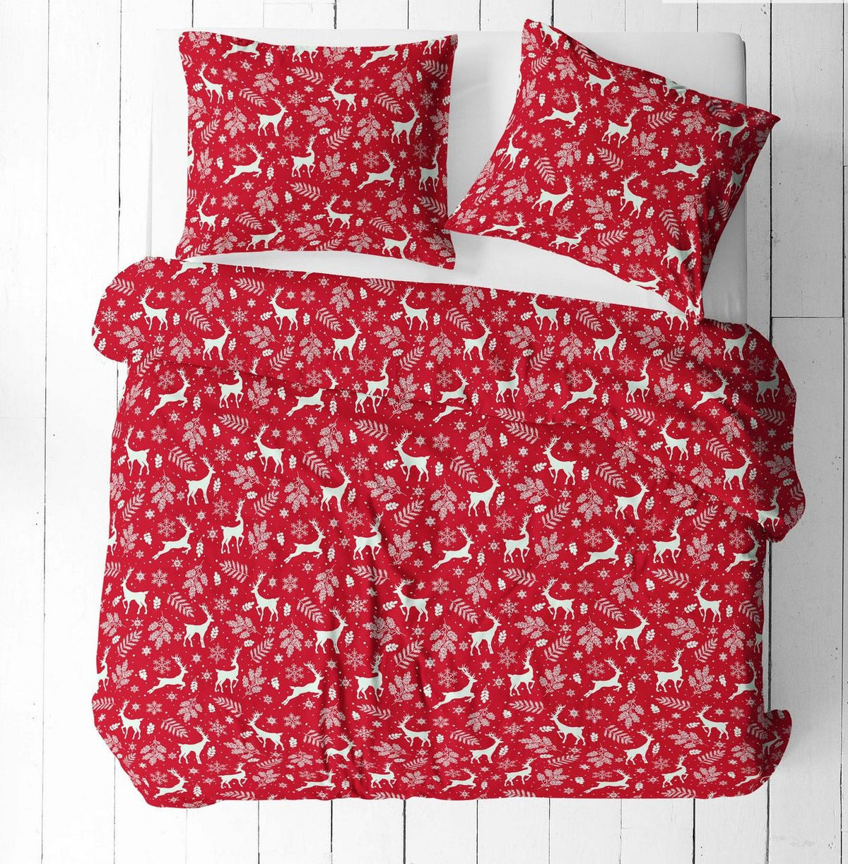 Image of 100% cotton fabric with white deer on a red background – available online at Charlotte Fabrics