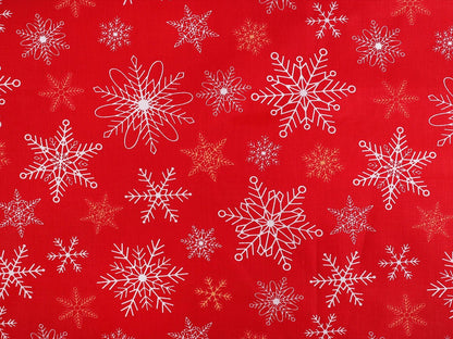 Image of 100% cotton fabric with flakes on red – available online at Šarlotes audumi