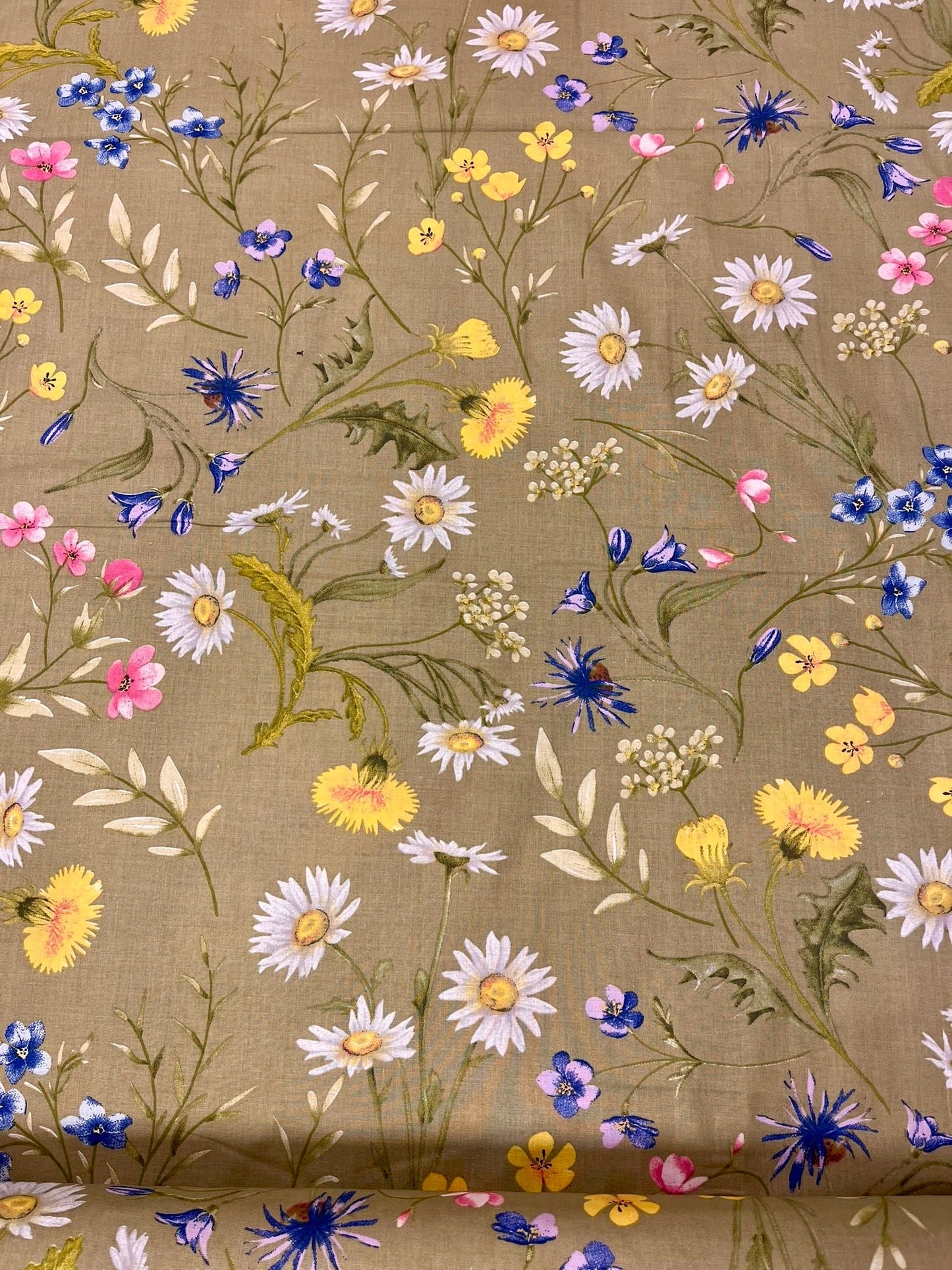 Image with 100% cotton fabric - meadow flowers on a green background 125 g/m² – available at Šarlotes audumi