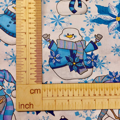 100% Cotton fabric - snowman with a blue hat on a white background 130 g/m²