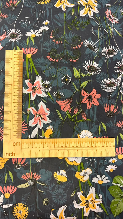Image of 100% cotton fabric with flowers on a dark background – available online Charlotte's Fabrics