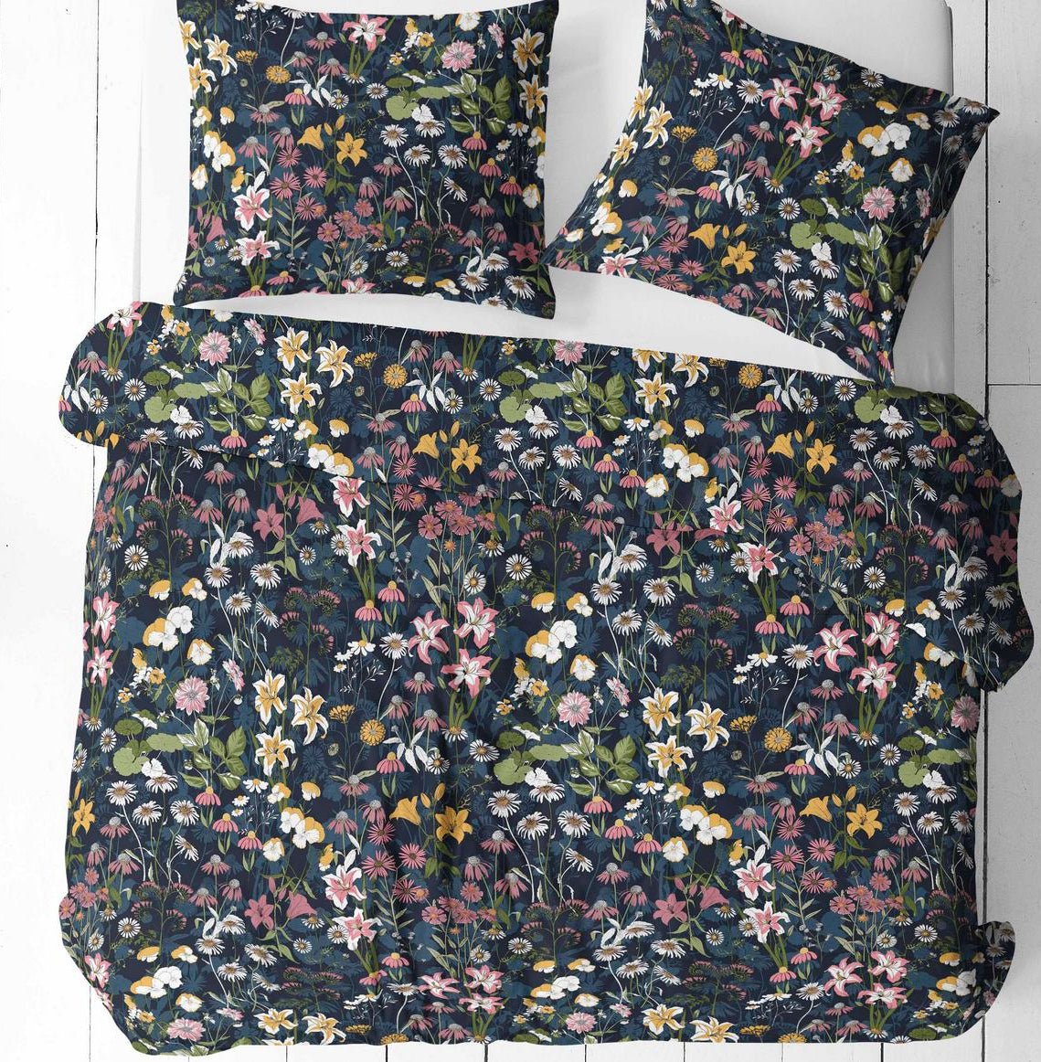 Image of 100% cotton fabric with flowers on a dark background – available online at Charlotte Fabrics
