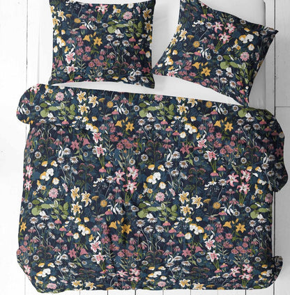 Image of 100% cotton fabric with flowers on a dark background – available online at Charlotte Fabrics