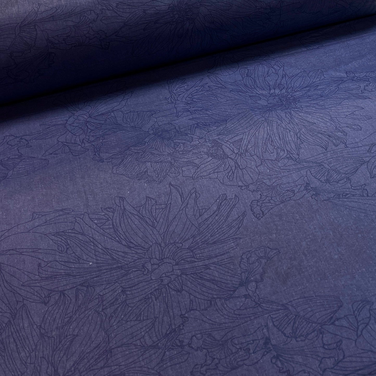Image with 100% cotton fabric - flowers on dark blue 220cm 146 g/m² – available at Charlotte's fabrics