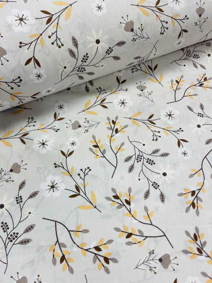 Tissu 100 % coton - motif fleurs et feuilles gris 125 g/m²