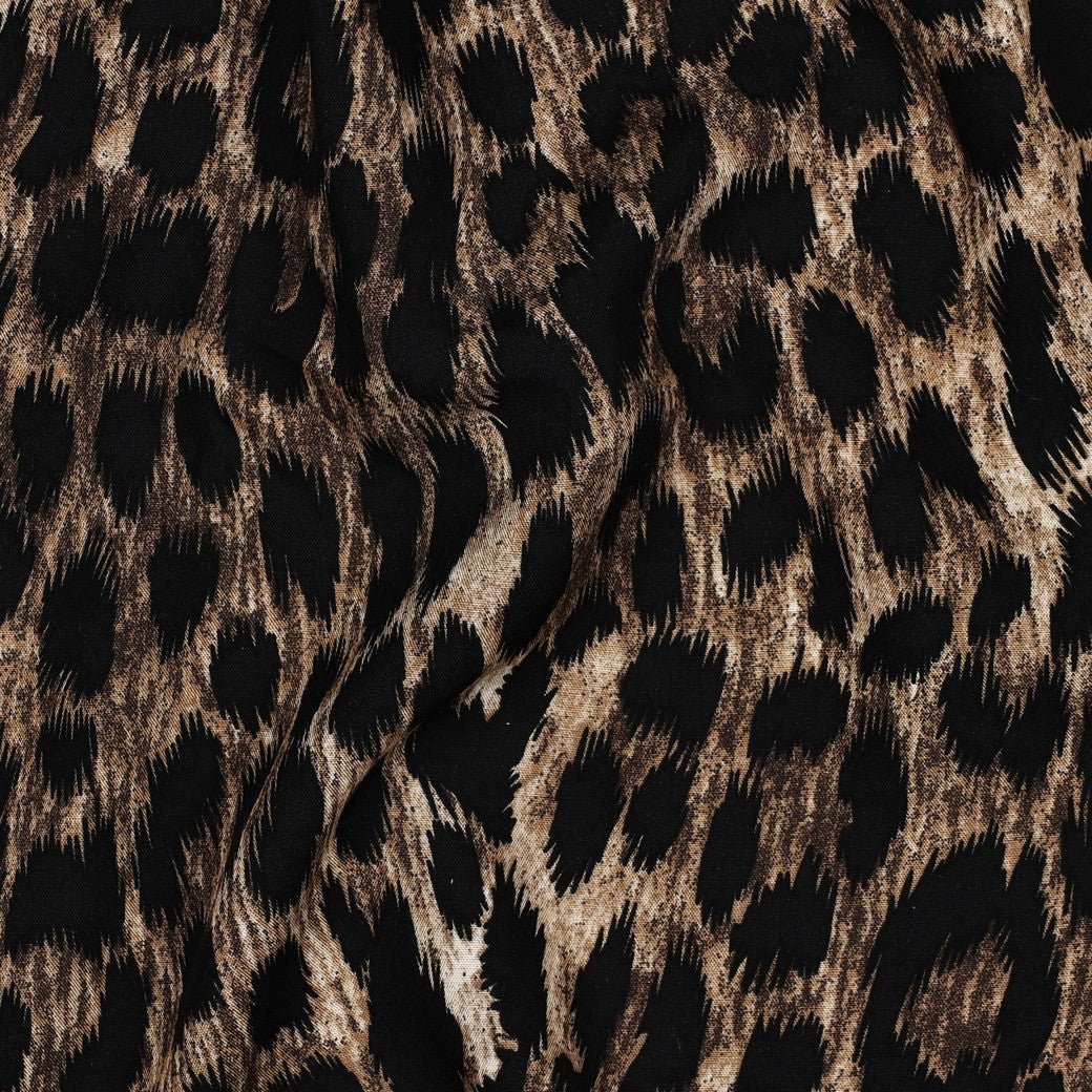 Image of 100% viscose leopard fabric – available online at Charlotte Fabrics