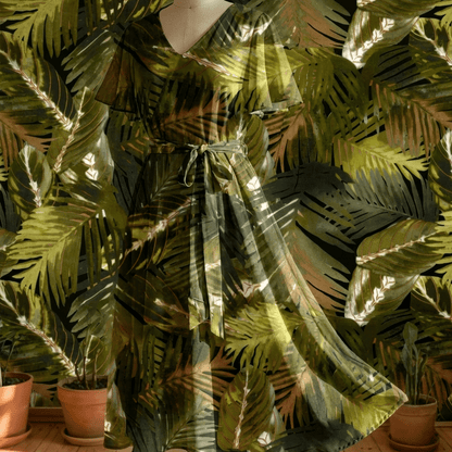 Image with 100% viscose fabric - green tropical leaves 125 g/m² – available at Šarlotes audumi