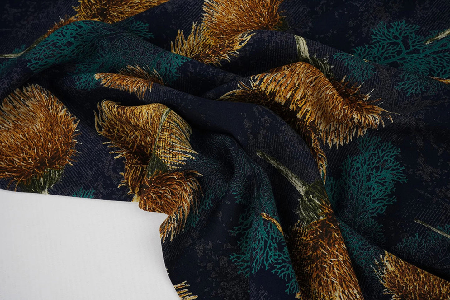 Image of 100% viscose fabric - gold dandelions on a dark blue background 115 g/m² – available at Charlotte's Fabrics