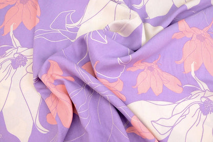 Tissu 100 % viscose - fleurs sur fond lilas 105 g/m²