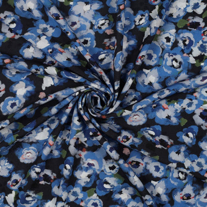100% Viscose fabric - blue floral motif 135 g/m²