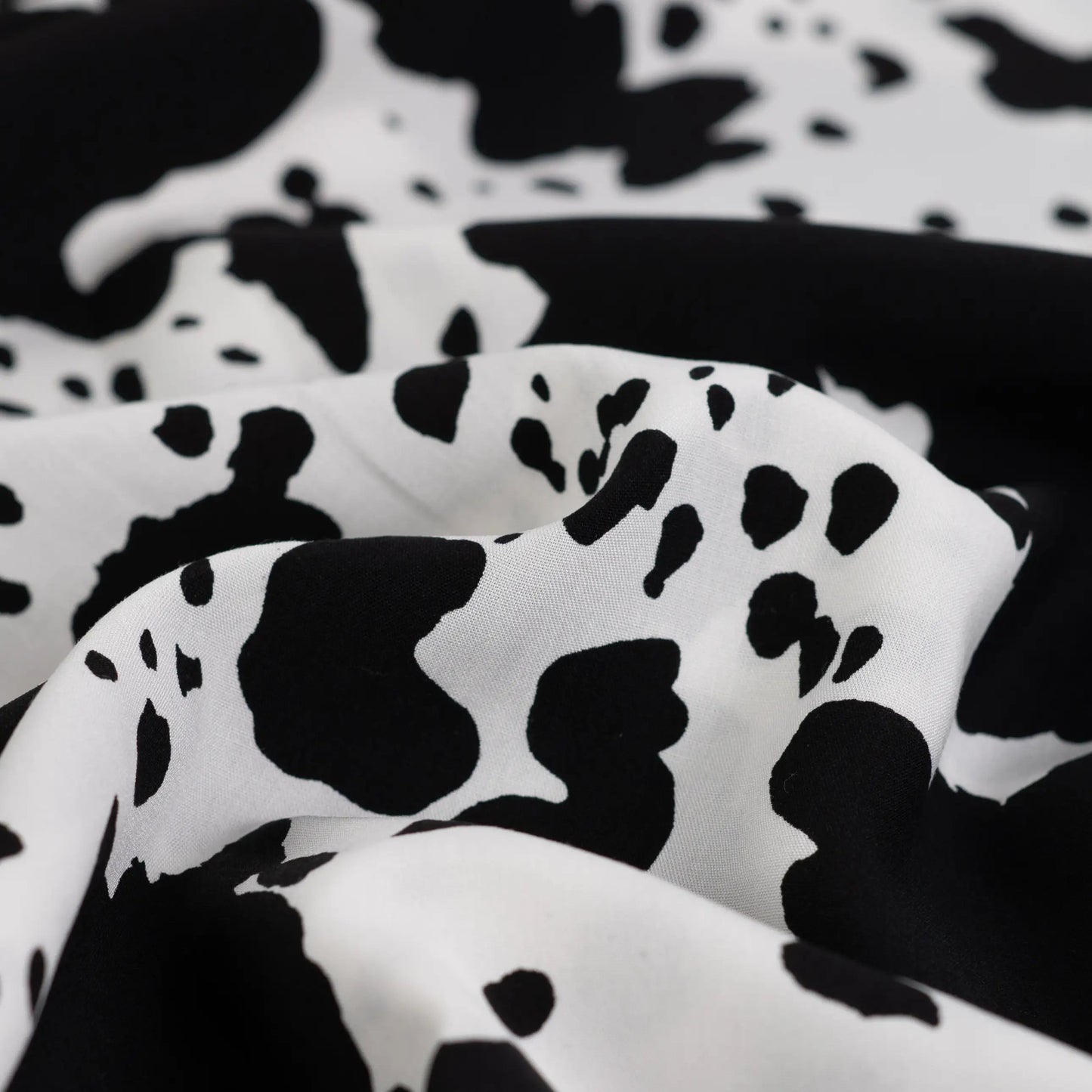 Image of 100% viscose satin - dalmatian print 105 g/m² – available at Šarlotes audumi