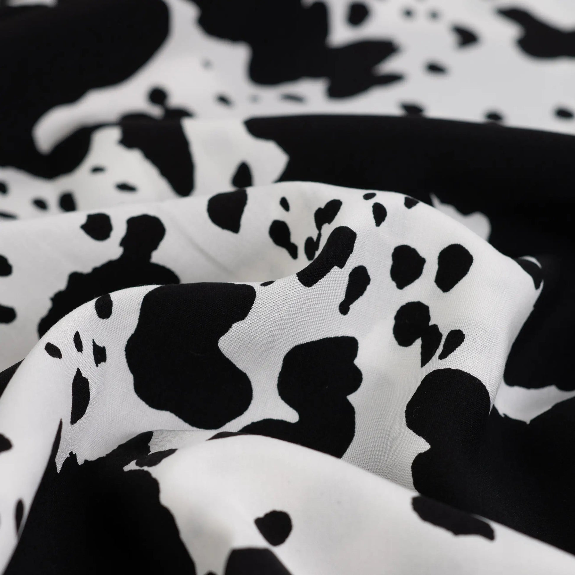 Image of 100% viscose satin - dalmatian print 105 g/m² – available at Šarlotes audumi