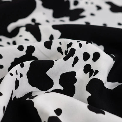 Image of 100% viscose satin - dalmatian print 105 g/m² – available at Šarlotes audumi