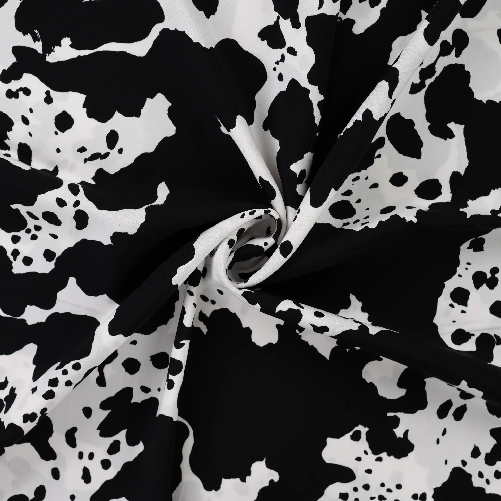 Image with 100% viscose satin - Dalmatian pattern 105 g/m² – available at Šarlotes audumi