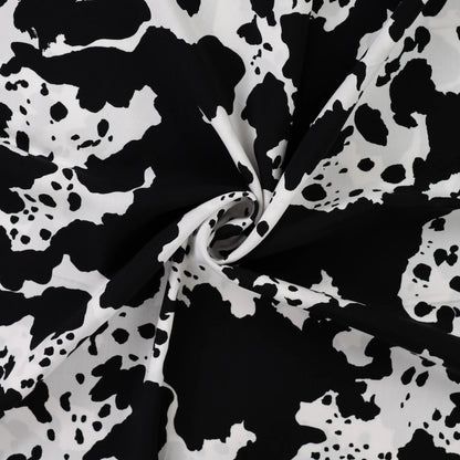 Image with 100% viscose satin - Dalmatian pattern 105 g/m² – available at Šarlotes audumi