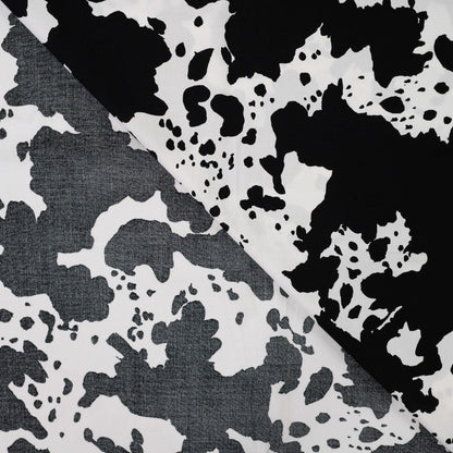 Image with 100% viscose satin - Dalmatian pattern 105 g/m² – available at Šarlotes audumi