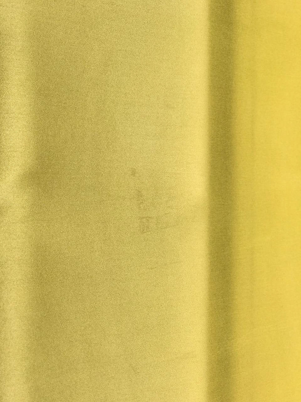 Image of 100% silk satin fabric in yellow – Italy, with a minor defect – available online at Šarlotes audumi