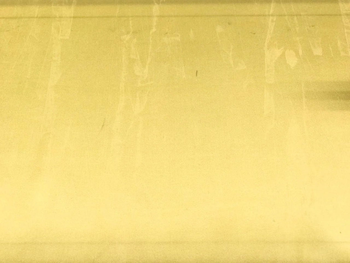 Image of 100% silk satin fabric in yellow – Italy, with a small defect – available online at Šarlotes audumi