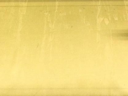 Image of 100% silk satin fabric in yellow – Italy, with a small defect – available online at Šarlotes audumi