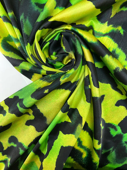 100% Silk satin - pattern on a green background 80 g/m²