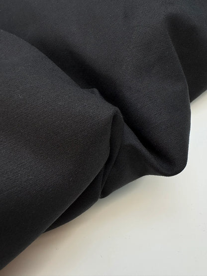 Tissu de costume noir en coton avec élasthanne et effet moiré – Italie