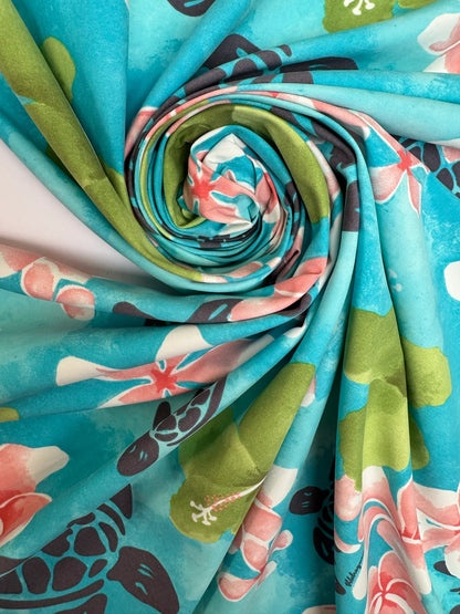 Tissu français à motif floral tropical dans des tons bleu-vert – 160 g/m²