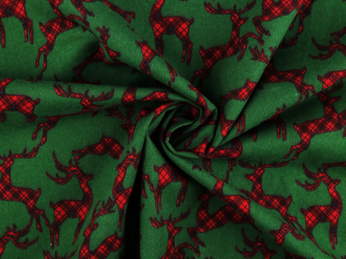 Christmas cotton flannel with reindeer on green