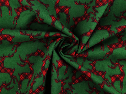 Christmas cotton flannel with reindeer on green