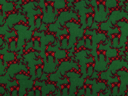 Christmas cotton flannel with reindeer on green